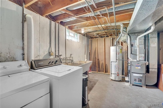 61 Caesar Blvd, Amherst, NY 14221 - below grade area featuring gas water heater, independent washer and dryer, a sink, and heating unit