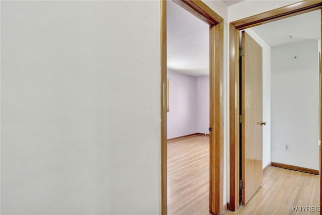 61 Caesar Blvd, Amherst, NY 14221 - corridor with light wood-type flooring and baseboards