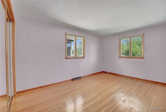 61 Caesar Blvd, Amherst, NY 14221 - spare room with light wood-type flooring and baseboards