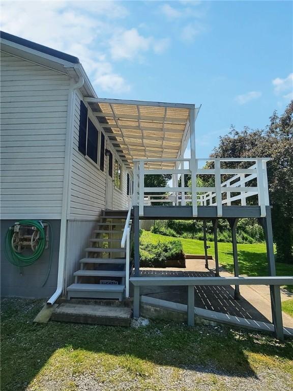 6251 Willard St, Aurelius, NY 13034 - exterior space featuring stairs and a wooden deck