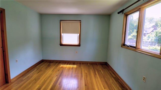 6251 Willard St, Aurelius, NY 13034 - spare room with wood finished floors and baseboards