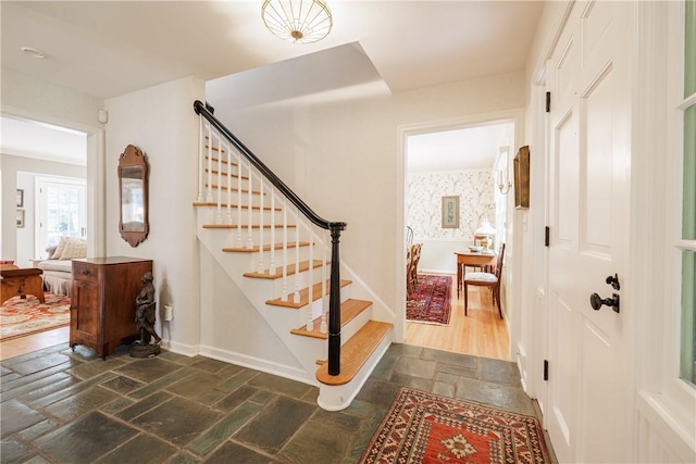 307 Allens Creek Rd, Brighton, NY 14618 - stairway featuring stone tile floors and baseboards