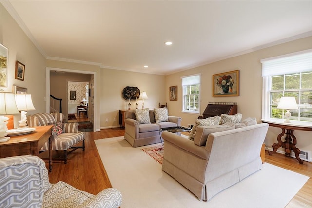 307 Allens Creek Rd, Brighton, NY 14618 - living area with ornamental molding, wood finished floors, recessed lighting, and baseboards