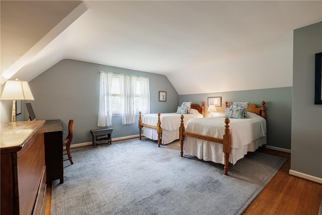 307 Allens Creek Rd, Brighton, NY 14618 - bedroom with vaulted ceiling, wood finished floors, and baseboards