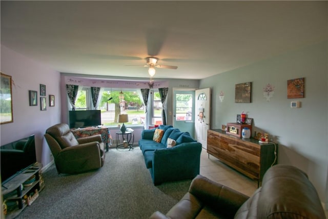 249 Glasgow St, Galen, NY 14433 - carpeted living room with healthy amount of natural light and ceiling fan
