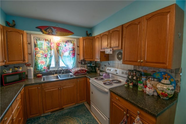 249 Glasgow St, Galen, NY 14433 - kitchen featuring white electric range, black microwave, a sink, and brown cabinets