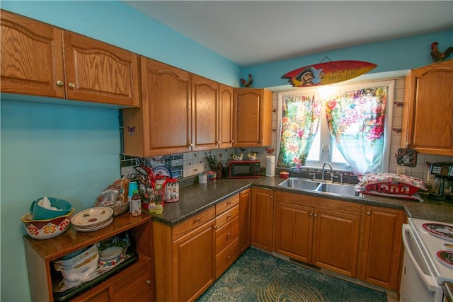 249 Glasgow St, Galen, NY 14433 - kitchen featuring a sink, black microwave, white range oven, tasteful backsplash, and brown cabinets