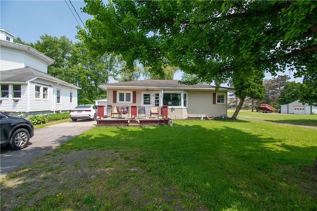 249 Glasgow St, Galen, NY 14433 - view of front of home with a front lawn and covered porch
