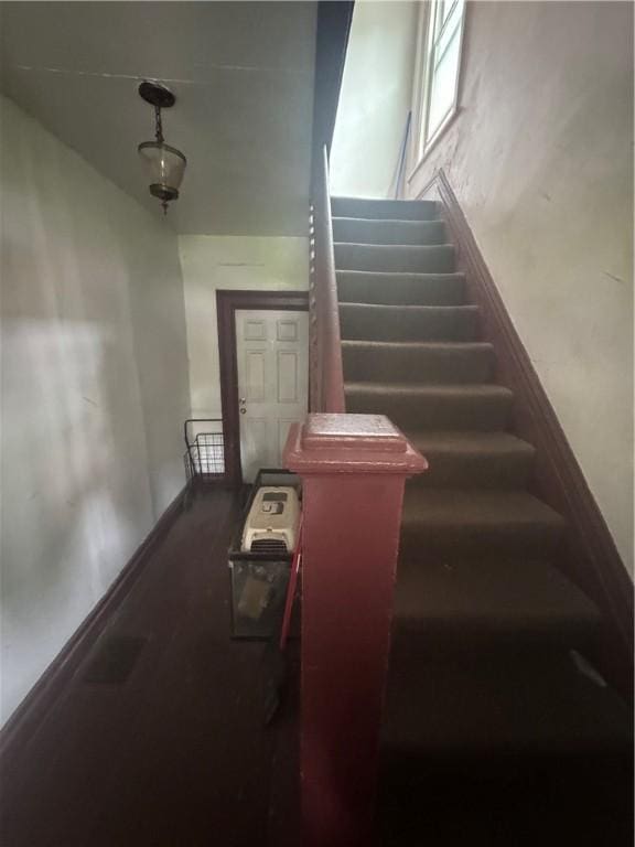 94 Lorimer St, Rochester, NY 14608 - staircase with baseboards