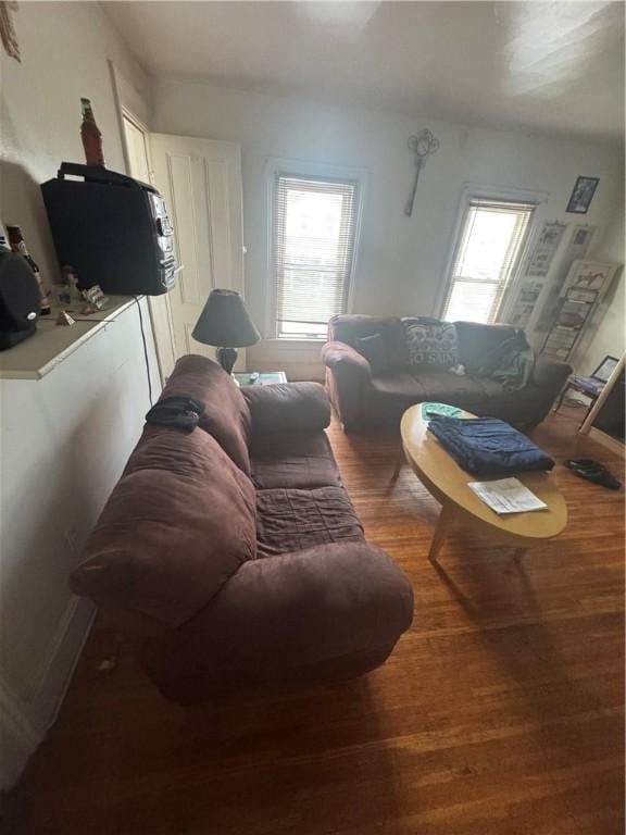 94 Lorimer St, Rochester, NY 14608 - living room with plenty of natural light and wood finished floors