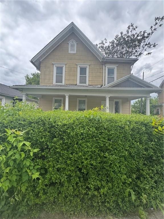 94 Lorimer St, Rochester, NY 14608 - view of front of property with a porch