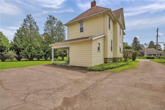 65 E Main St, Arcade, NY 14009 - view of side of property with a chimney and a shingled roof