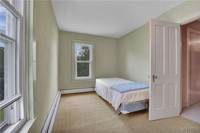 65 E Main St, Arcade, NY 14009 - bedroom with a baseboard heating unit and carpet flooring