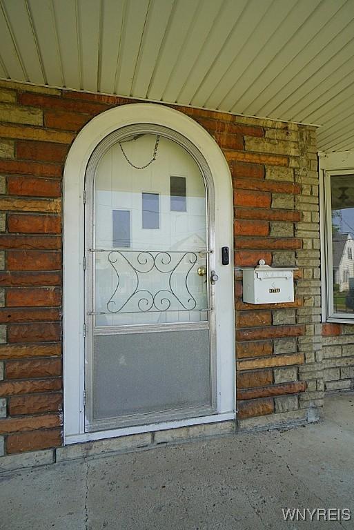 2927 S Ave, Niagara Falls, NY 14305 - property entrance featuring brick siding