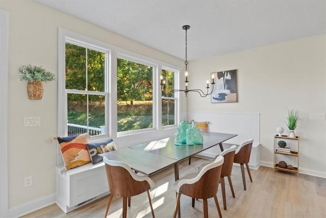 96 Chase Meadow Trl, Mendon, NY 14472 - dining room with light wood finished floors, a chandelier, baseboards, and breakfast area