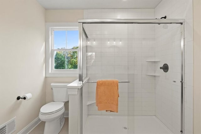 96 Chase Meadow Trl, Mendon, NY 14472 - bathroom with toilet, a stall shower, and baseboards