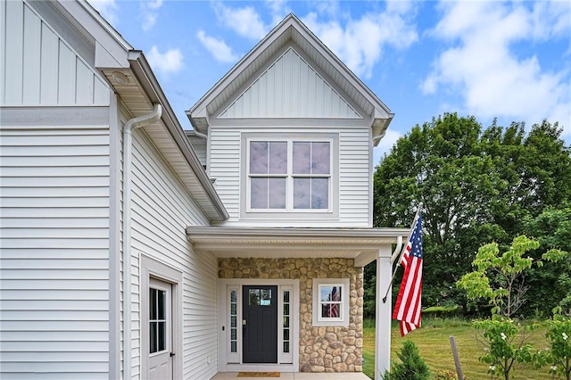 96 Chase Meadow Trl, Mendon, NY 14472 - view of front of house with board and batten siding and stone siding