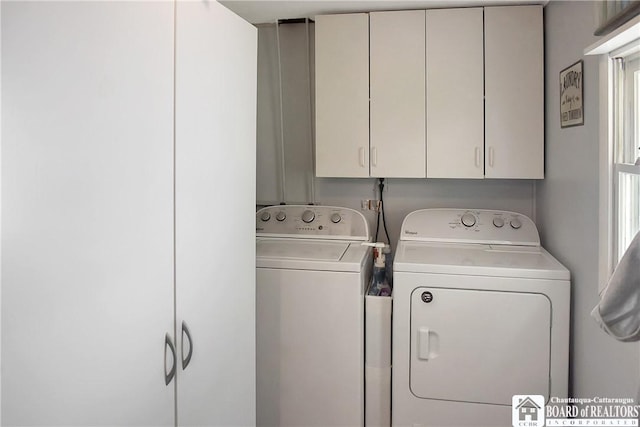 3938 S Ralph Ave, Ellery, NY 14712 - washroom featuring separate washer and dryer, cabinet space, and healthy amount of natural light