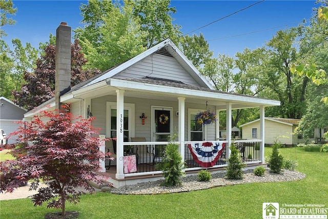 3938 S Ralph Ave, Ellery, NY 14712 - view of front facade featuring a porch, a front lawn, and a chimney