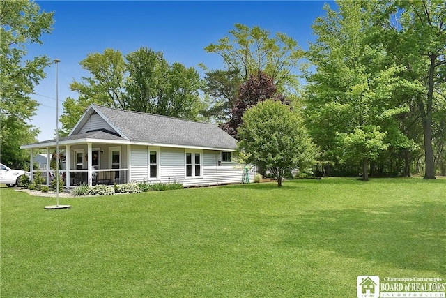 3938 S Ralph Ave, Ellery, NY 14712 - view of front of house with a front lawn and roof with shingles