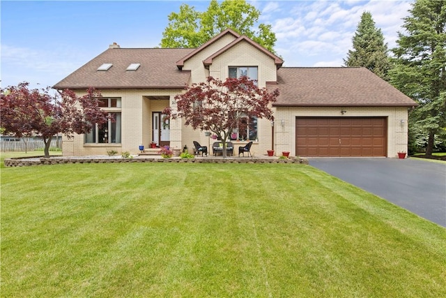 106 Shingle Landing Dr, Irondequoit, NY 14609 - view of front of property featuring driveway, brick siding, a garage, and roof with shingles
