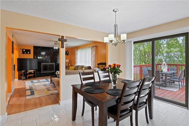 106 Shingle Landing Dr, Irondequoit, NY 14609 - dining space featuring a chandelier and light tile patterned floors