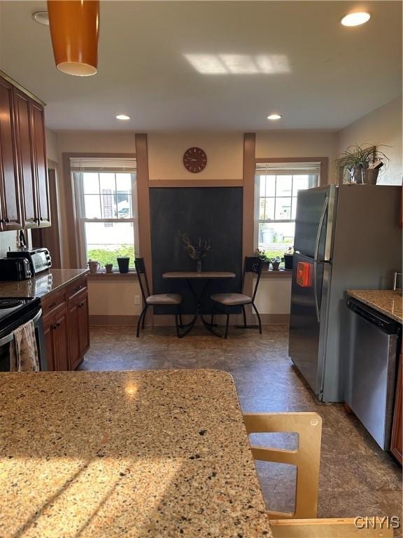 28 Payne St, Hamilton, NY 13346 - kitchen featuring appliances with stainless steel finishes, plenty of natural light, light stone countertops, and recessed lighting