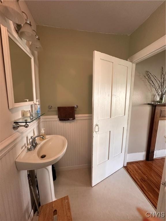 28 Payne St, Hamilton, NY 13346 - bathroom featuring wainscoting