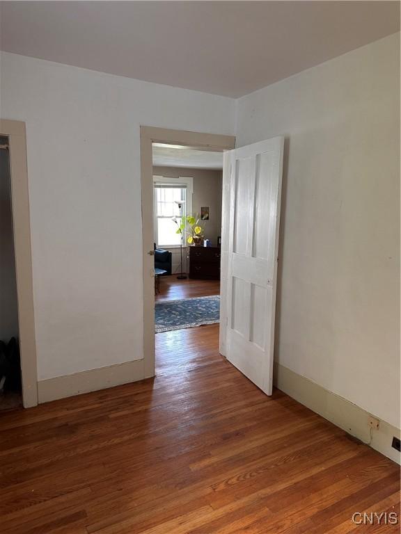 28 Payne St, Hamilton, NY 13346 - unfurnished room with wood finished floors