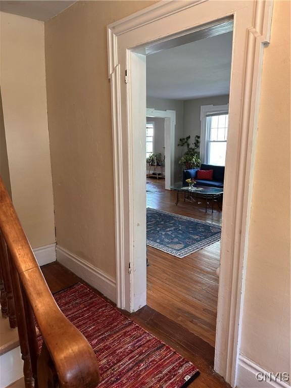 28 Payne St, Hamilton, NY 13346 - hall with wood finished floors and baseboards