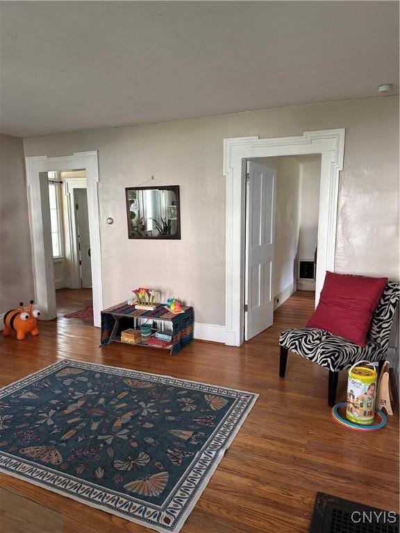 28 Payne St, Hamilton, NY 13346 - living area with wood finished floors and baseboards