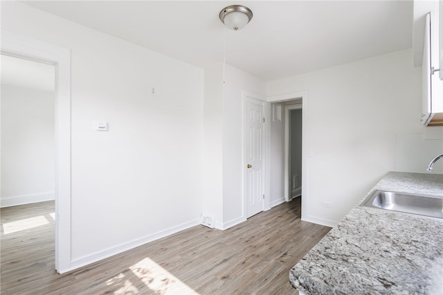 65 Hoff St, Rochester, NY 14621 - dining room featuring light wood-type flooring and baseboards