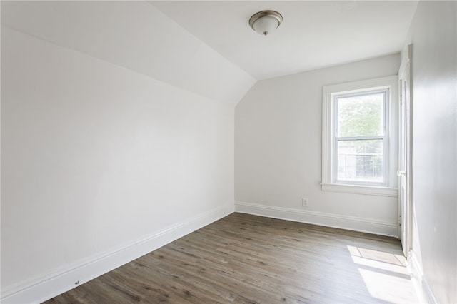 65 Hoff St, Rochester, NY 14621 - additional living space featuring vaulted ceiling, wood finished floors, and baseboards