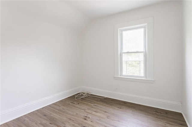 65 Hoff St, Rochester, NY 14621 - bonus room featuring wood finished floors, vaulted ceiling, and baseboards