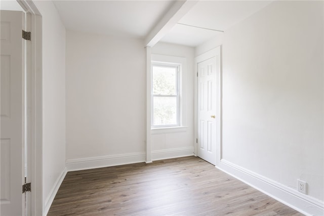 65 Hoff St, Rochester, NY 14621 - empty room with wood finished floors and baseboards