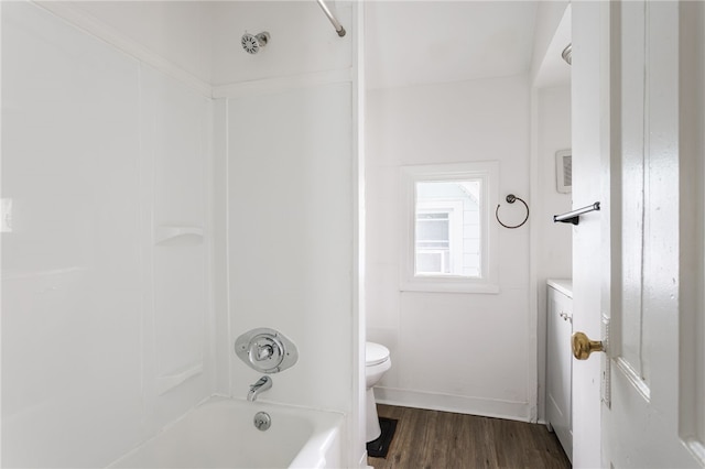 65 Hoff St, Rochester, NY 14621 - bathroom with toilet, bathing tub / shower combination, wood finished floors, and baseboards