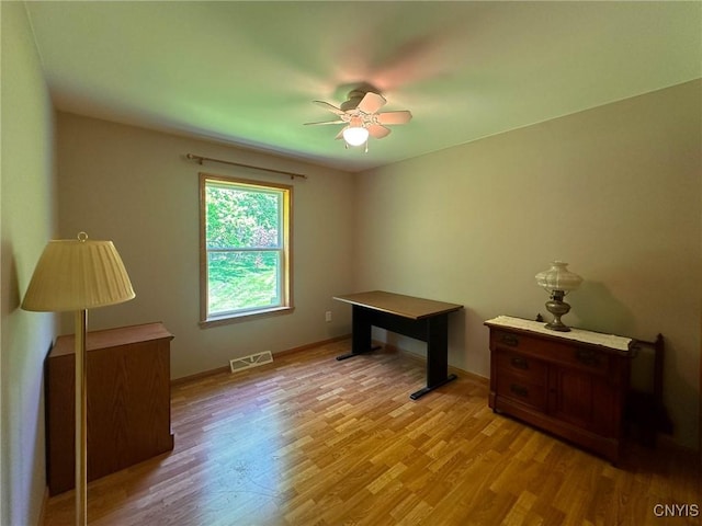 7554 Camroden Rd, Floyd, NY 13440 - home office with light wood-style floors, ceiling fan, and baseboards