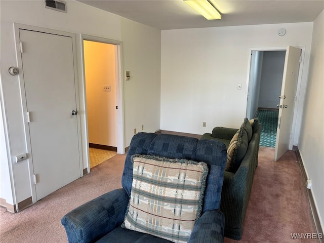 639 17th St, Niagara Falls, NY 14301 - carpeted living room featuring baseboards