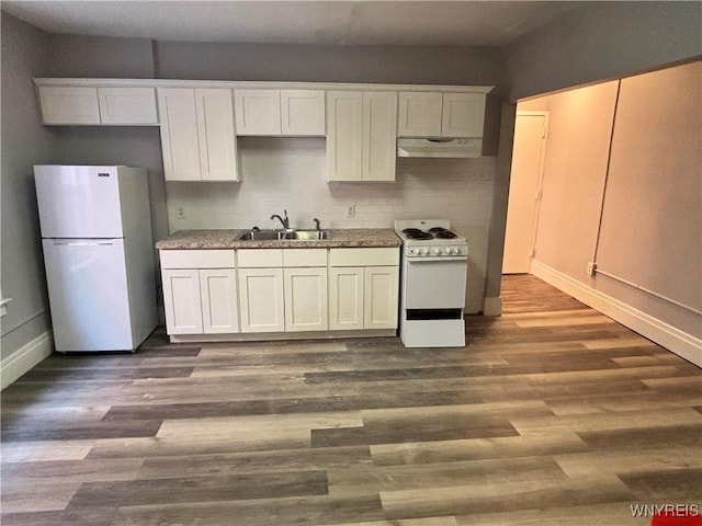 639 17th St, Niagara Falls, NY 14301 - kitchen with white appliances, under cabinet range hood, a sink, baseboards, and dark wood-style floors