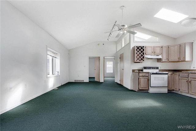 639 17th St, Niagara Falls, NY 14301 - kitchen with electric range, vaulted ceiling, under cabinet range hood, a ceiling fan, and dark colored carpet