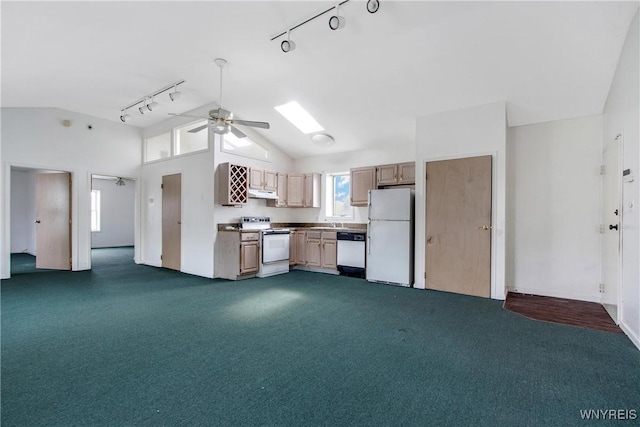 639 17th St, Niagara Falls, NY 14301 - kitchen featuring white appliances, rail lighting, vaulted ceiling, under cabinet range hood, and dark colored carpet