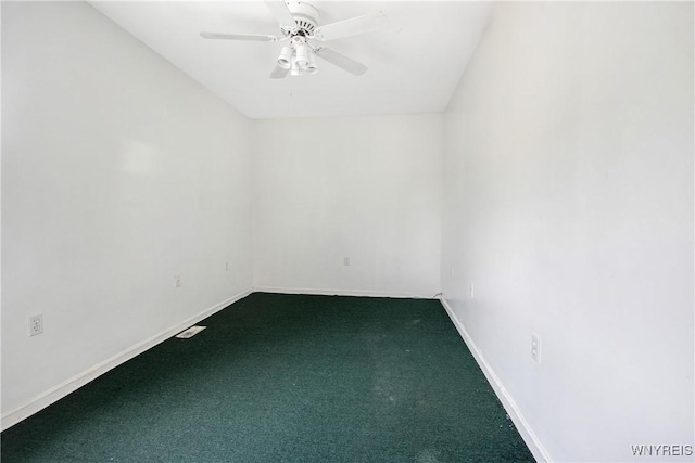 639 17th St, Niagara Falls, NY 14301 - spare room with dark colored carpet, a ceiling fan, and baseboards
