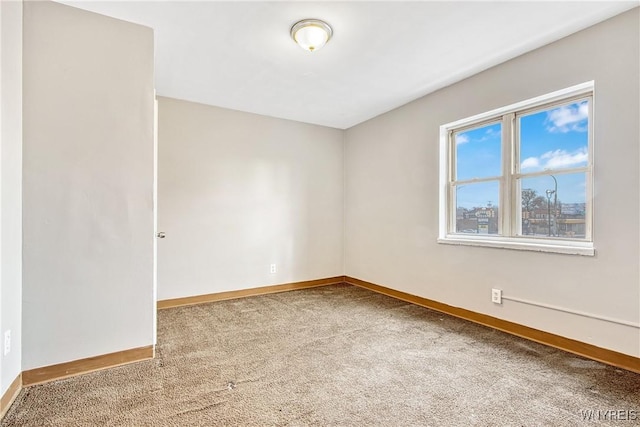 639 17th St, Niagara Falls, NY 14301 - carpeted spare room featuring baseboards