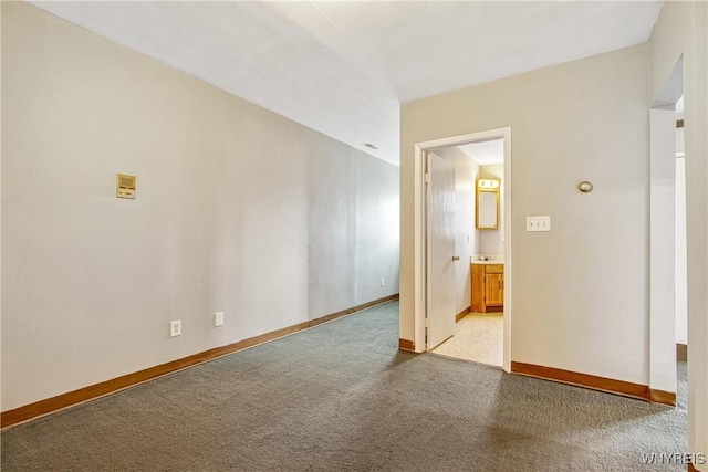 639 17th St, Niagara Falls, NY 14301 - unfurnished room with baseboards and light colored carpet