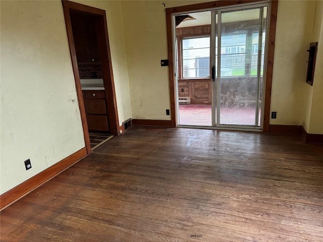 46 Kirby St, Bainbridge, NY 13733 - unfurnished room with wood finished floors and baseboards