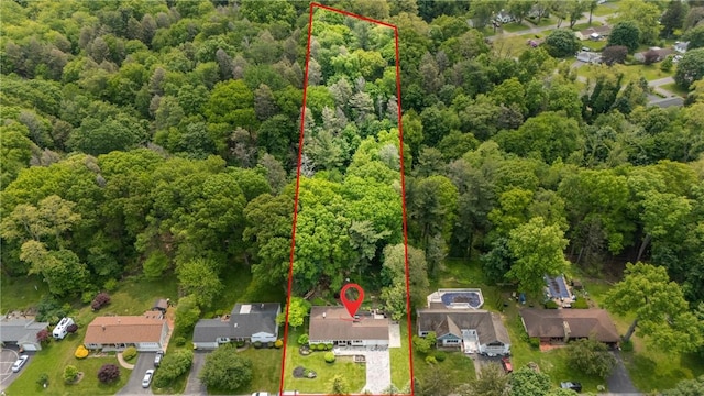 529 Backus Rd, Webster, NY 14580 - aerial perspective of suburban area featuring a heavily wooded area and property parcel outlined