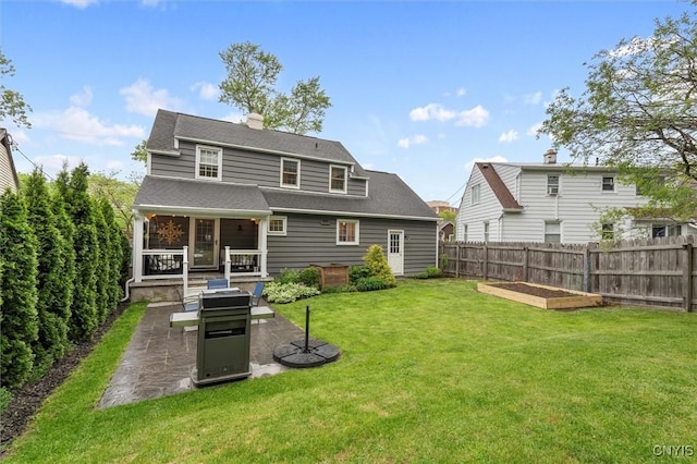 101 Doll Pkwy, Syracuse, NY 13214 - rear view of house featuring a garden, a chimney, and roof with shingles