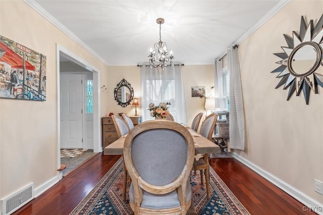 101 Doll Pkwy, Syracuse, NY 13214 - dining room with a chandelier, wood finished floors, baseboards, and crown molding