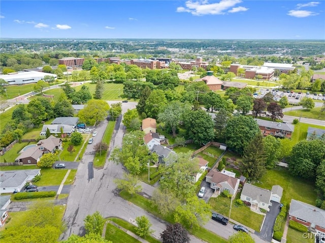 101 Doll Pkwy, Syracuse, NY 13214 - aerial overview of property's location with nearby suburban area and a tree filled landscape