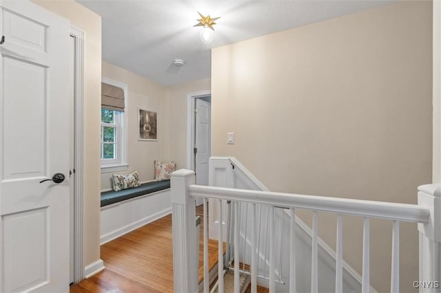 101 Doll Pkwy, Syracuse, NY 13214 - corridor with an upstairs landing and light wood-style flooring